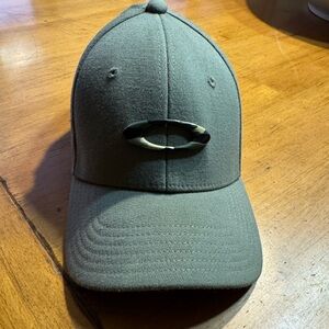 Oakley Dark Green Hat with Iconic Multicam Cano Emblem